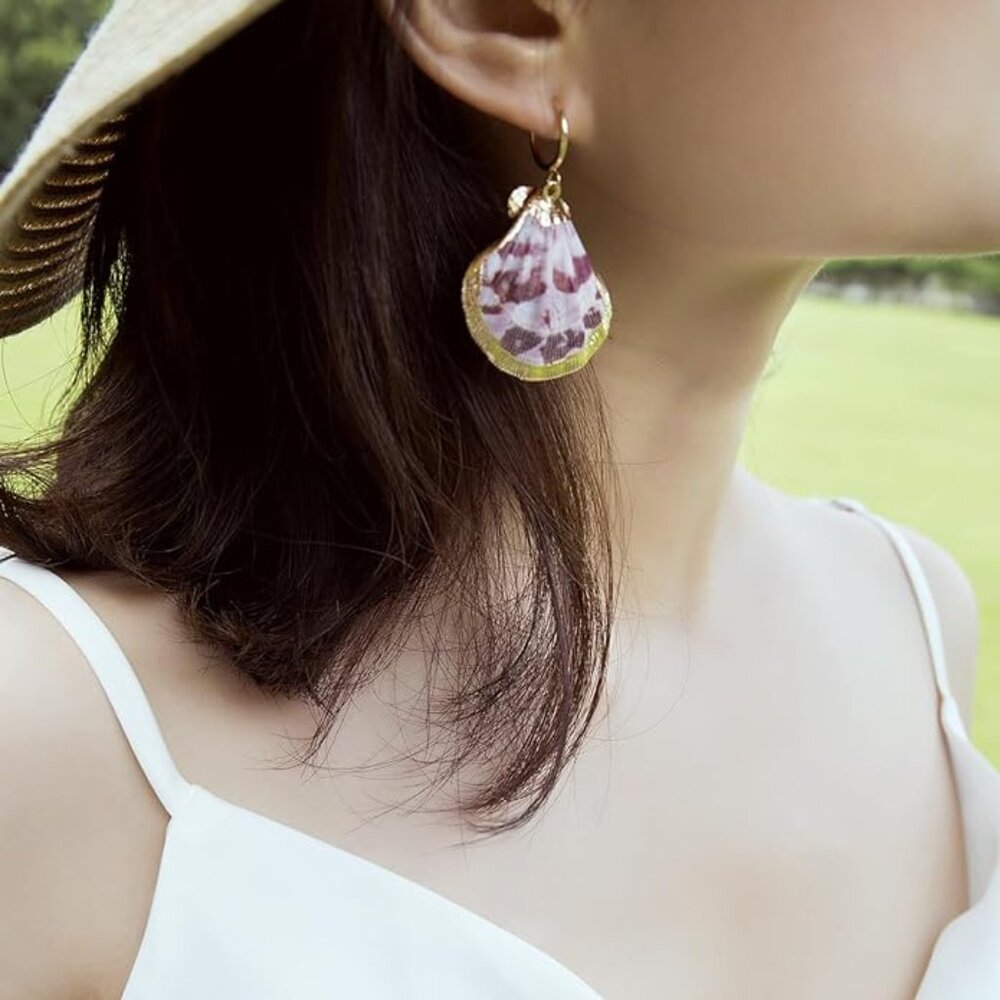 Gold sea shell pendant earrings